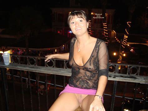 Almost Nude In A Short Skirt And Transparent Tops And Showing Her Boobs And Pussy