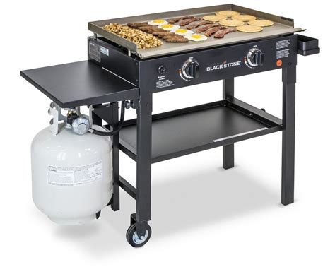 This grill pan takes the place of two—or more. Blackstone 2-Burner Flat Top Propane Gas Grill with Side ...