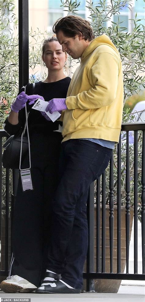 Margot elise robbie is an australian actress and producer. Margot Robbie and husband Tom Ackerley wear latex gloves ...