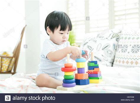 Baby Boy Playing With Blocks Stock Photo Alamy