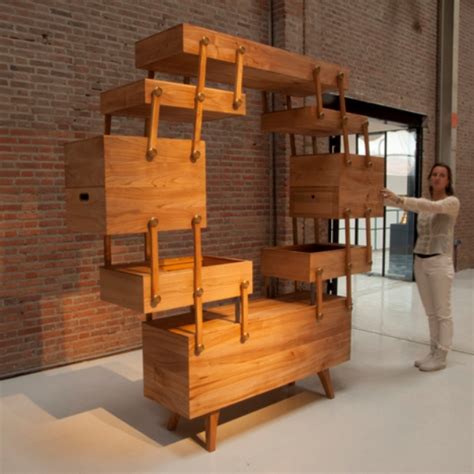 Add a unique stylish storage to your living room, hallway, or bedroom with this cabinet. Unusual Sewing Box Cabinet With A Tricky Mechanism | DigsDigs