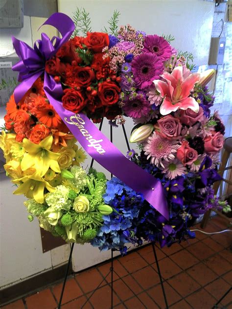 During the tough time following the loss of a loved one, proflowers can help make things a little easier with the absolute best and most fresh funeral standing spray arrangements. Color wheel standing spray, amazing spray of all the ...