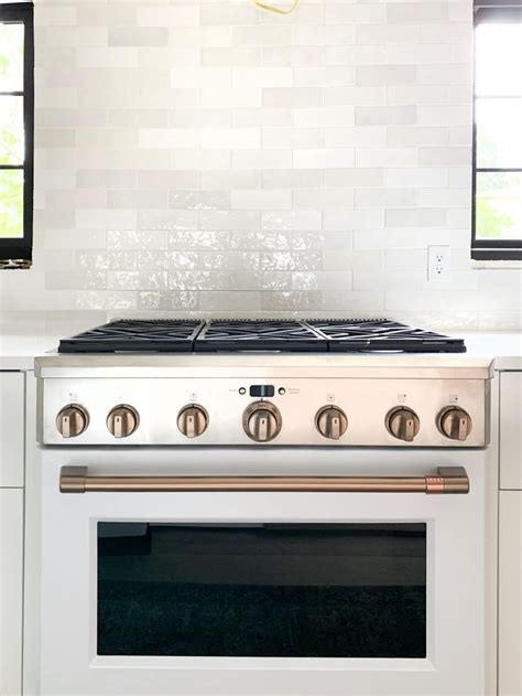 Brushed bronze metal finish replacement bar only (wall mounting hardware not included) can adjust in length in original packaging. The White and Brush Bronze Cafe Appliances that have my ...