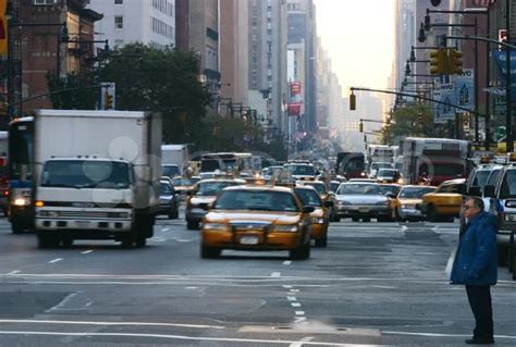 Time Lapse Movie Of A Busy New York City Street As Traffic Races