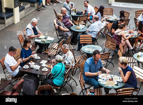 Sitting Eating And Drinking Hi Res Stock Photography And Images Alamy