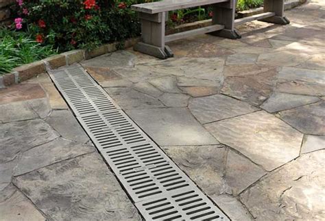 The width of your trench should also be wide enough to fit your french drain in, as well as at least 25mm either side. Drainage Correction | Patio, Modern patio, Patio garden