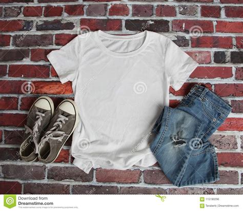 Download Mockup Flat Lay Of White Tee Shirt Stock Photo - Image of brick, shirt: 115190296
