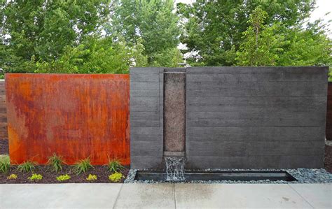 Nice decorated garden enhances the look of any home, but. Modern Steel Arbor and Poured Concrete Water Feature in ...