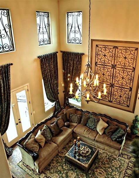 Two Story Traditional Living Room With Faux Iron Window