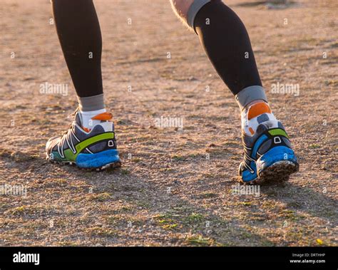 Details Of Feet Of Runner In A Trail Outdoors Stock Photo Alamy