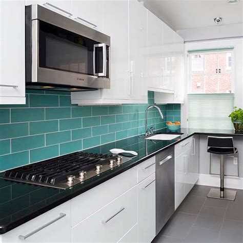A galley kitchen can really benefit from the use of a window to brighten and help make the space look bigger. Fun New Galley Kitchen Remodel - Case Design/Remodeling