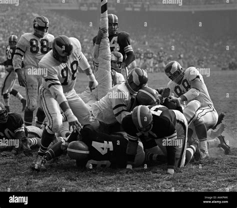 1950s Close Up Of Pro Football Game Pile Up Around Goal Post Stock