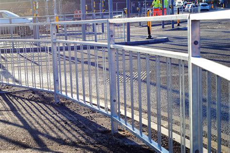 Stair railing and guard building code guidelines. Distance between signal posts and pedestrian guardrail