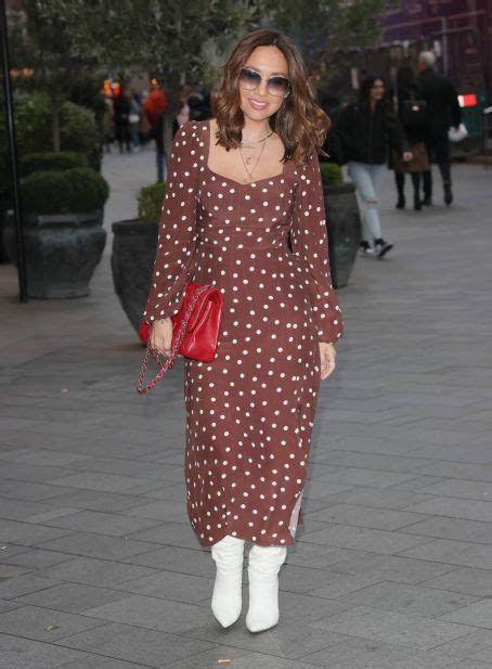 Myleene Klass Wearing A Polka Dot Dress And Knee High Boots At Smooth Radio In London