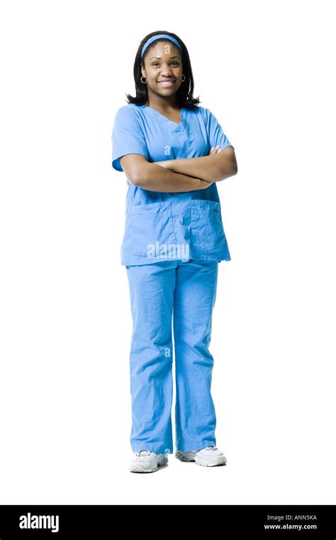 Portrait Of A Female Nurse Standing With Her Arms Crossed Stock Photo