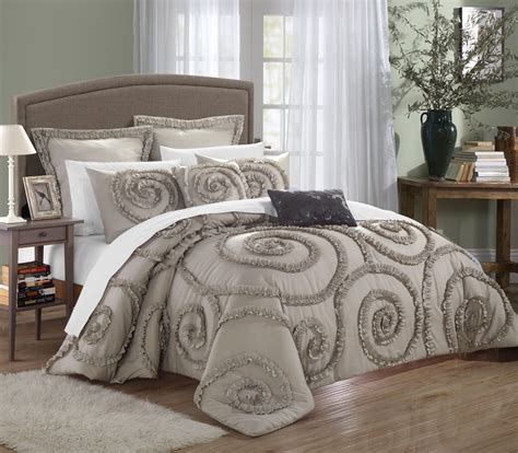 This opulent set offers character and a sense of style that will sure add a sophisticated look alongside simplicity. Chic Home 7-Piece Rosalia Ruffled Etched Embroidery ...