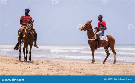 Local African People Having Fun On The Ghana Ocean Coastline Editorial