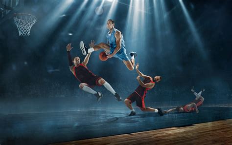 Basketball Players Fighting For Ball With Champion Scoring A Goal At