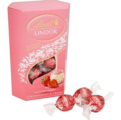 Experience bliss with lindt lindor smooth melting strawberries & cream white chocolate truffles. Lindor Strawberries & Cream Truffles 200g | Truffles, Lindt truffles, Strawberries, cream