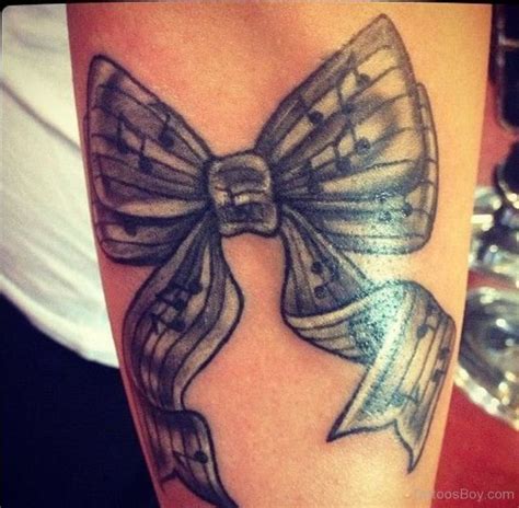 There is a heart shape at the bow's middle. Bow Tattoos | Tattoo Designs, Tattoo Pictures