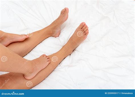 mother and daughter feet in the bed stock image image of women texting 225993517