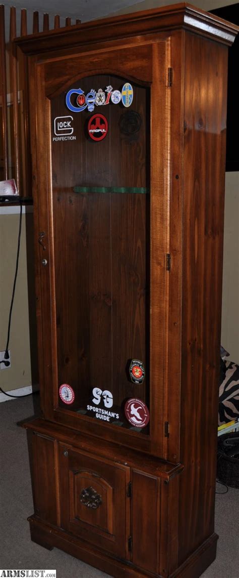 Holding up to 10 guns, including double barreled shotguns and most. ARMSLIST - For Sale: Glass front gun cabinet