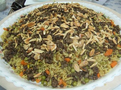 This is a good, healthy recipe that is a cinch to make. Chicken Ouzi Recipe =Rice with carrots and peas from Palestine! We make it with phyllo dough ...