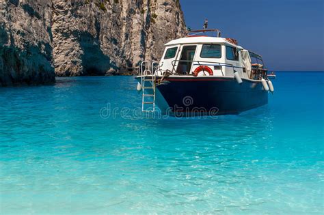 Boat Anchored On Navagio Beach Also Known As Shipwreck