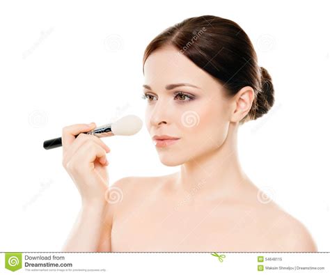 Portrait Of A Young Woman With A Makeup Brush Stock Image