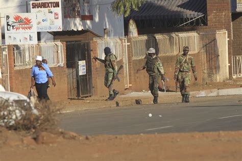 Zimbabwe Inquiry Finds Army Police Killed 6 During Protest Ap News
