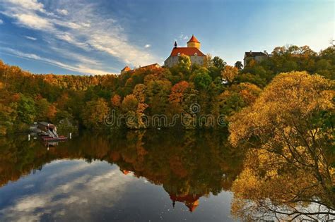 Beautiful Autumn Landscape With River Castle And Blue Sky With Clouds