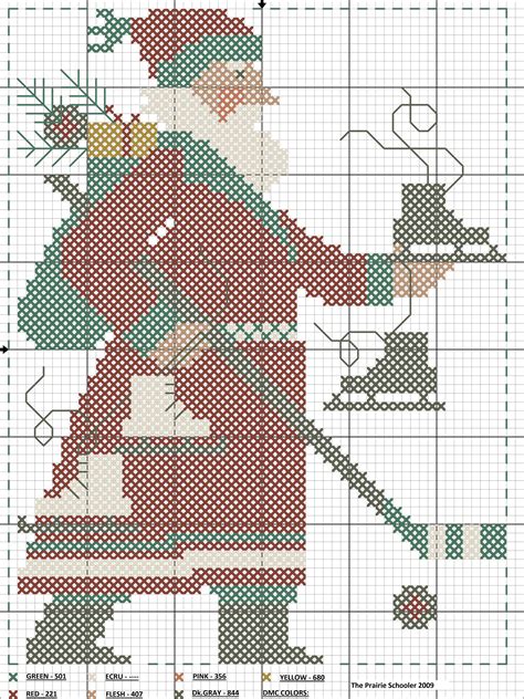 a cross stitch pattern with a santa clause holding a sleigh on it s shoulder