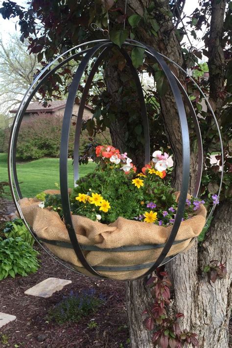 10 Cool Outdoor Planters For People Who Literally Kill Every Plant