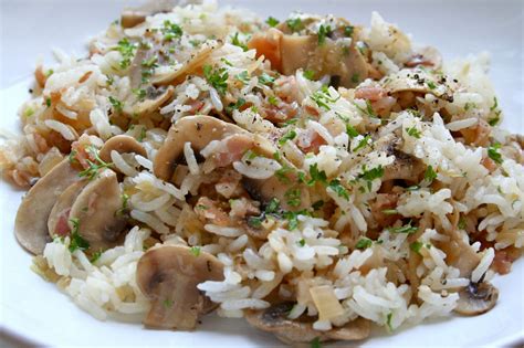 Reboza los champiñones limpios, primero en el huevo batido y después en el bol con la mezcla de pipas y harina de almendra. Receta de arroz blanco con champiñones - Unareceta.com