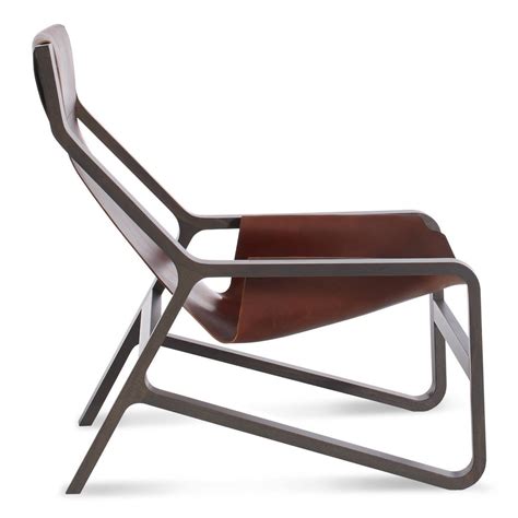 29″ w, 38″ d, 32″ h and the table are 35″. High & Low: Leather Sling Chairs | Apartment Therapy