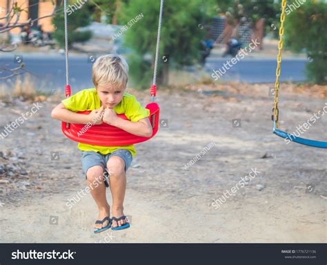 Sad Lonely Boy Sitting On Swing Stock Photo 1776721136 Shutterstock