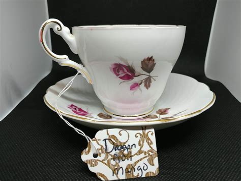 These Are Antique Cup And Saucer Sets With A Touch Of Checky Cuteness To Add To Your Coffee