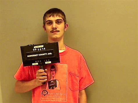 Meta Mugshot 19 Year Old Poses For Mugshot Wearing Shirt Featuring His