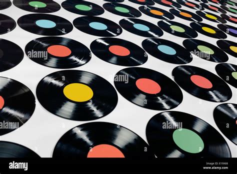 Colorful Collection Of Vinyl Records On Grey Background Angle View
