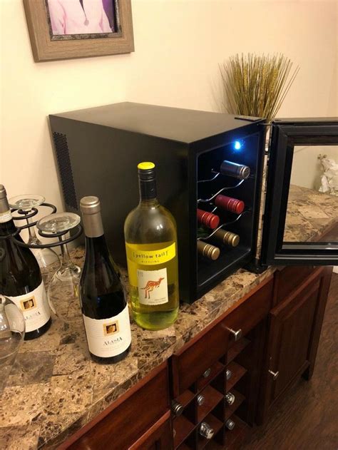 This simple electric unit comes on a sturdy charging stand, and it can open 80 bottles before needing to be recharged. Small Wine Cooler Compact Countertop Beverage Fridge Mini ...