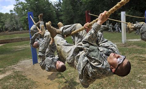 Filearmy Soldiers Run Through An Obstacle Course At Ft Benning