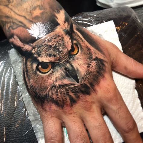 12 Best Owl Hand Tattoo Designs Petpress Hand Tattoos For Guys