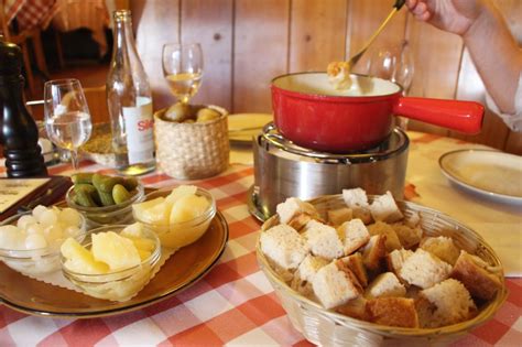 Raclette, (a word derived from the french verb racler, meaning, to scrape) has been a tradition in. swiss cuisine: fondue + raclette | Well-Traveled Wife