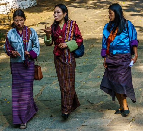 bhutan women wearing the traditional kira bhutan travel thunder dragon bhutanese king photo