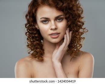 Beautiful Woman Naked Shoulders Curly Hair Stock Photo