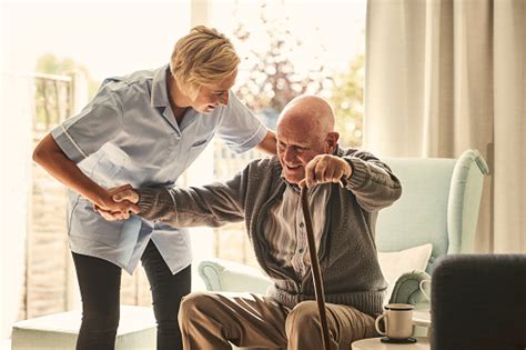Content updated daily for opencare senior plan reviews. Female Healthcare Worker Supporting Senior Man At Care ...