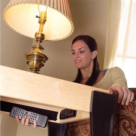 OUT OF SIGHT -- WITHIN EASY REACH. If remotes are cluttering your
