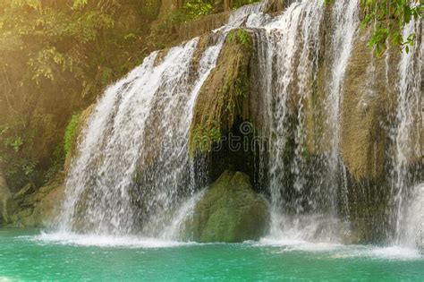 Beautiful Waterfall And Emerald Pool In Tropical Rain Forest In