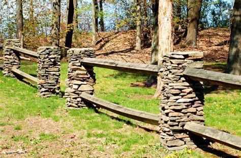 As time progressed and the populations increased and the towns became cities, fencing but the suburban areas are slowly picking it up as a way to add more charm to the curb appeal of a home. Stone Column's and wood fence. | Driveway fence, Stone fence, Split rail fence