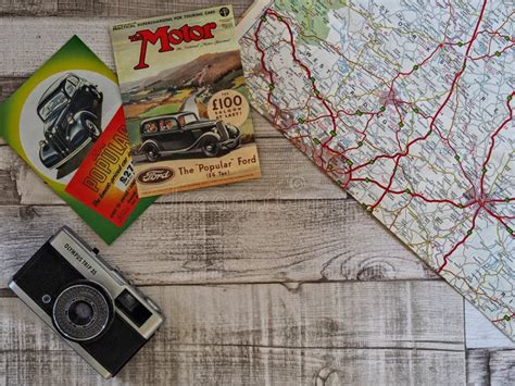 Vintage British Road Trip With Postcards Of Cars And A Map Editorial